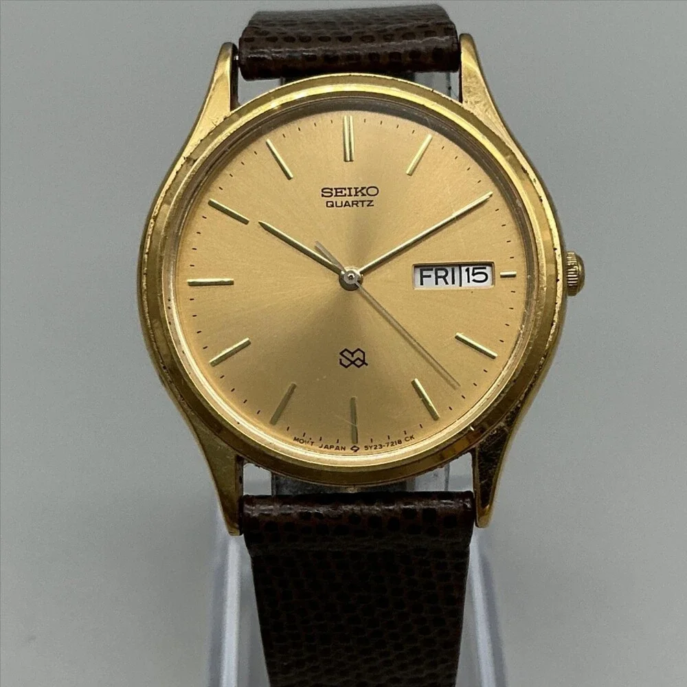 Vintage Seiko Mens Watch 34mm Gold Tone Leather Day Date 5Y23-7079 New Battery